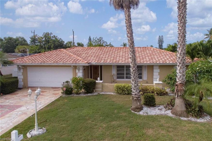 BEAUTIFUL POOL HOME SOUTHERN EXPOSURE located close to downtown Cape Coral.This house has a great tile roof,Large heated pool with Large Screened Lanai area.Lanai has a Pass-Thru to the Kitchen and Slider Doors to family room.living room and master bedroom.Bathrooms have been updated with one opening to pool area.Family room has Vaulted Beam ceiling.Floors are tile and Laminate in Bedrooms.Newer Allpliances and up-dated Kitchen with Breakfast bar.Property is fenced for Privacy.Beautiful Stamped Driveway. All House openings has special Automatic storm Shutters.This property is 1914 sq ft under air and a total square footage of 3604. House is close to Yacht Club Public Beach,Downtown Cape Coral and 35 minutes from SWFL Airport.Beachs of Sanibel and Fort Myers are only a short drive.