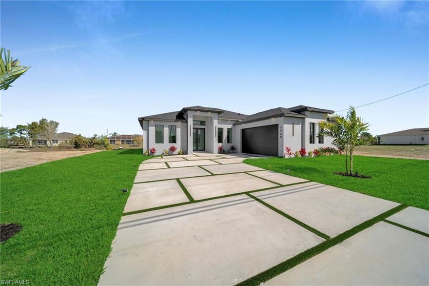 Welcome to this stunning new construction waterfront home on a navigable canal, featuring one of the most desirable south-facing backyards in the growing NE area of Cape Coral! This beautifully designed property offers 3 bedrooms + den, 3 full bathrooms, and a spacious open-concept layout perfect for everyday living.

The home features a bright and open living area with tray ceilings, a modern kitchen with quartz countertops, sleek cabinetry, and stainless steel appliances, plus a pantry and dedicated laundry room for added convenience. The split floor plan provides privacy, with a comfortable master suite that includes dual walk-in closets and a spa-style bathroom.

Step outside to the covered lanai and enjoy your waterfront setting, perfect for relaxing or entertaining, with plenty of space to add a future pool. Customize your backyard—pool construction available with financing options. The south-facing backyard brings in abundant natural sunlight throughout the day.

Some images may be virtually staged. Schedule your showing today!