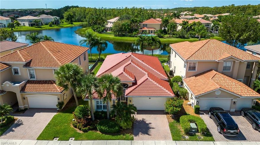 Wow! Gorgeous lake views from this 2 bedroom + Den, 2 bath Pool home, which features New tile roof (2023) newer A/C (2021) accordion storm shutters, and new paint inside and out. This move-in ready home has many upgrades from crown molding and plantation shutters through-out, beautiful kitchen with custom white cabinets and granite counter tops, spacious floor plan with volume ceilings and a elegant front door. A huge owners suite with plank vinyl flooring, 2 walk-in closets & owners bath with dual sinks, upgraded cabinets, lg. walk-in shower and garden tub. An ample guest bedroom, guest bath, den, living, dining room and eat in kitchen completes this lovey home.  Relax and enjoy the beautiful outdoor living space that includes a screened lanai and an open pool deck with wrought iron fence, and custom landscape lighting in both the front & rear of the home. Wonderful community of Botanica Lakes, which offers resort like amenities such as Pickleball, tennis, fitness center, pool, spa, and so much more for a low HOA fee that also include cable, internet, security and lawn care. Excellent location!! Great Value!! A Must See!!!