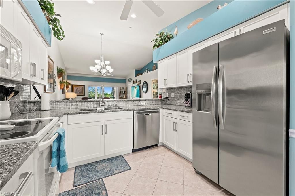 Photo of 26751 Clarkston DR #205, BONITA SPRINGS, FL 34135 (MLS # 226013778)