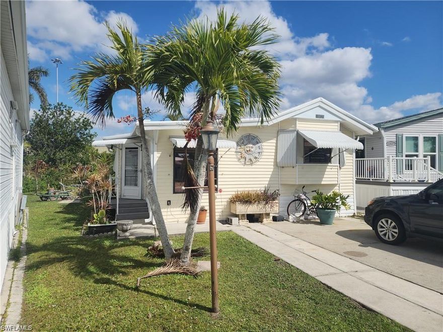 We invite you to experience this beautifully maintained home in Corkscrew Woodlands—Move-In Ready and waiting for you! Enjoy a vacation-style lifestyle in this partially furnished mobile home, nestled within the highly sought-after gated 55+ community. The location is unbeatable, offering convenient access to everything you need while surrounded by a vibrant, amenity-rich neighborhood.

This spacious home features an open-concept layout filled with natural light, creating a warm and welcoming atmosphere. Recent updates include a brand-new A/C unit, metal roof and new kitchen flooring, adding comfort and modern appeal. With low HOA fees, this property offers both value and lifestyle.

Ideally situated near shopping, dining, golf courses, the airport, and major highways—everything you need is just minutes away.

This move-in-ready home is perfect for anyone seeking a relaxed, low-maintenance lifestyle in a welcoming and active community.
Schedule your showing today—this one won’t last!