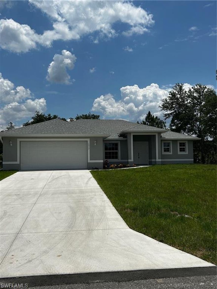 READY FOR OCCUPANCY!! Must see this luxuriously upgraded 3 Bedroom + Den 2 Bath home on an oversized half acre lot. Features include huge screened rear porch under truss, extra large den/office, 2 car garage with opener. Home comes with many upgrades such as granite counters in kitchen and baths, wood cabinets, stainless steel appliance package, double pane energy saver windows, brushed nickel plumbing fixtures and upgraded fan and light fixtures throughout entire home, glass inset backslash in kitchen, top of the line luxury vinyl flooring through main living area and bedrooms, tile baths. Decorative tile inserts in bath, upgraded base and door trim. A must see - won't last! *** Home is complete, C/O issued and ready to sell.***