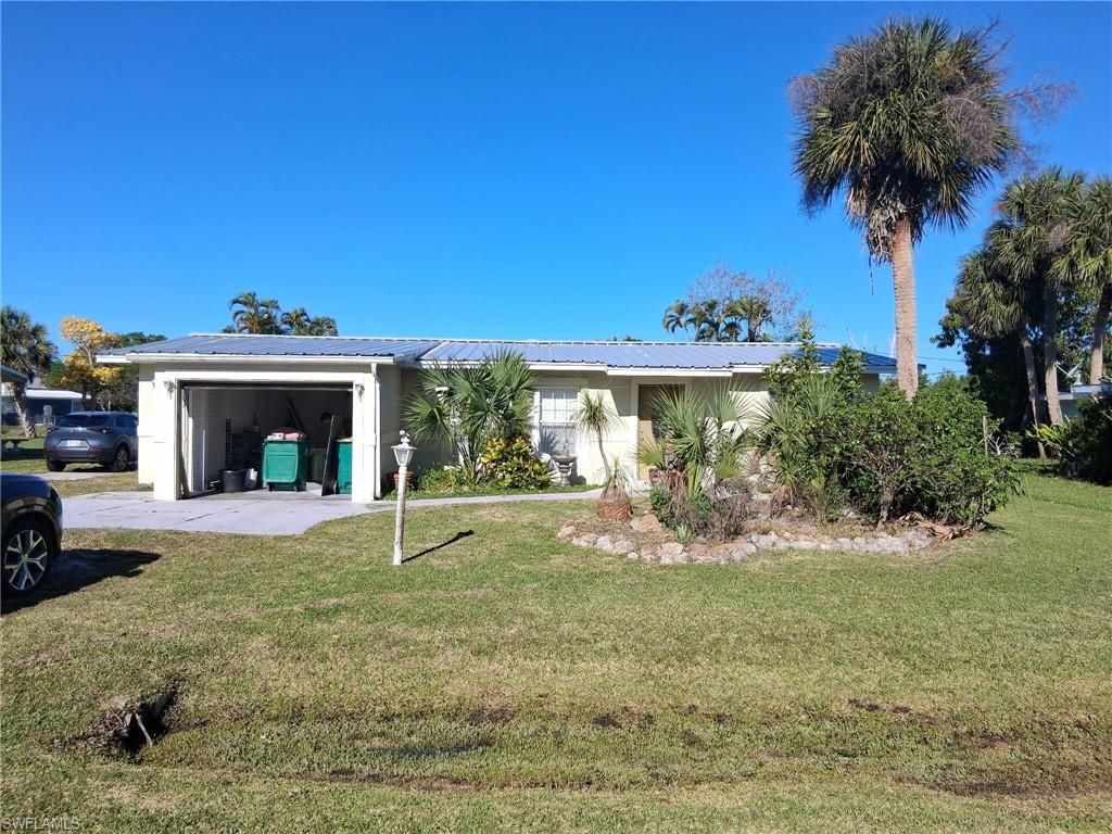 Photo of 3311 Ash ST, PUNTA GORDA, FL 33950 (MLS # 226013542)