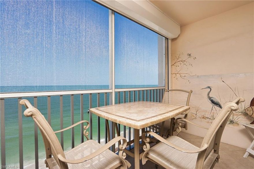 This Condo Rental is a beachfront beauty! This End unit location, you will experience more of a southern exposure panoramic views and spectacular sunsets. Renovated and tastefully decorated with coastal décor. Upgrades include wood flooring in the living areas, stainless appliances, slate countertops, farmers sink, beautiful backsplash in kitchen, designer lighting, plantation shutters on some windows, large stacked washer and dryer, and so much more! The primary suite features a king bed, TV, walk-in closet, and ensuite bathroom with glassed enclosed walk-in shower. The guest bedroom features a queen bed and guest bathroom with combo tub and shower. The fully equipped kitchen area has a breakfast bar, and dining area for 4. The living area has a sofa, two chairs and a large screen TV. This unit also comes with a storage area outside the unit, 1 covered parking space, and WIFI. Enjoy the beach, shelling, dolphin watching, or just relax on the beach. The pool and common area have been completely remodeled.