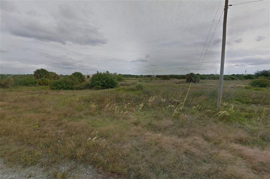 This **CLEARED OFF LOT** backs up to a canal in the rear with a large easement that also creates a larger land area! Enjoy a rarity in Lehigh Acres with having a canal in your backyard to have a little Florida water oasis. Located just off Milwaukee Blvd and Alabama Rd! Quiet street off the main roads mean little to no thru-traffic! Seller also owns several other lots if interested. Not far to grocery stores, and other amenities. Major airport just a quick drive away (RSW Southwest International Airport), as well as other adventures to explore: Fort Myers Beach, JetBlue Stadium (Home of the Red Sox spring training), Hammond Stadium (Home of the Twins spring training). Activities nearby include Lehigh Acres Community Park North; Lehigh Acres Trailhead Park; Lee County Manatee Park offering waterfront park providing paved trails, up-close views of manatees, an amphitheater & kayak rentals; Caloosahatchee Regional Park with sprawling, nearly 770-acre park featuring trails for mountain biking & hiking plus campsites & more. SW Florida living is truly paradise! Reserve your piece of paradise in the Sunshine State today while prices are still affordable.