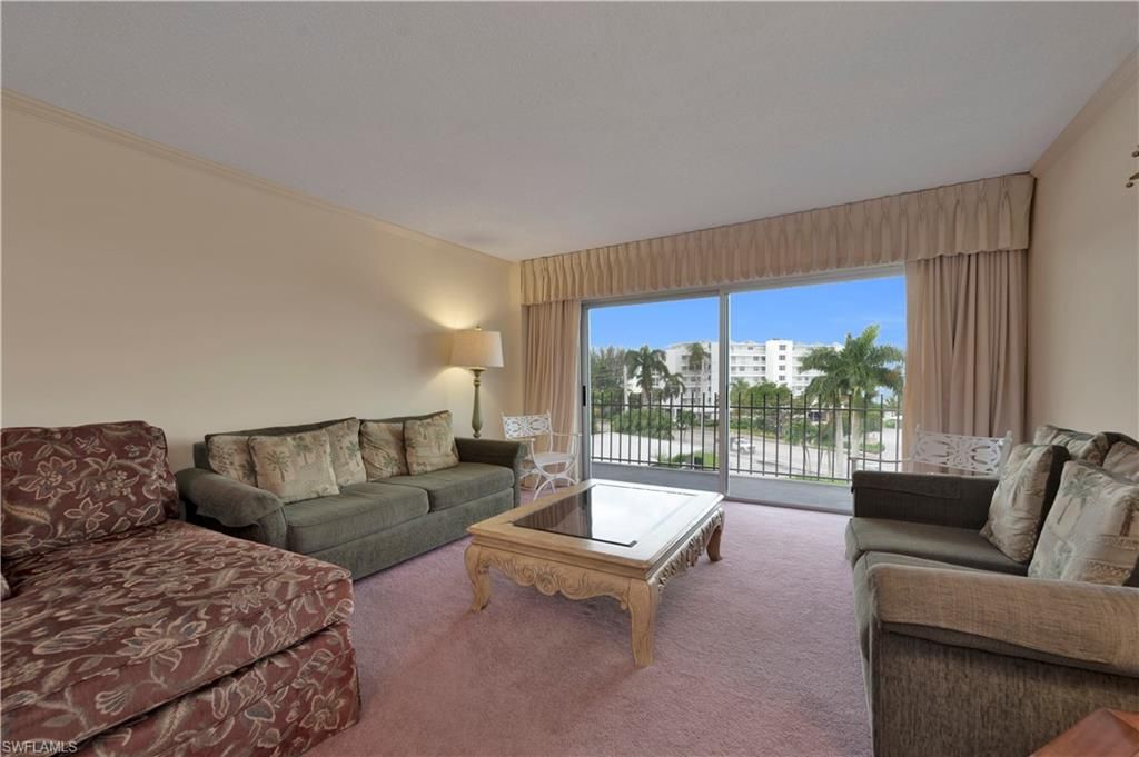 Photo of 2150 Gulf Shore BLVD N #411, NAPLES, FL 34102 (MLS # 225059084)