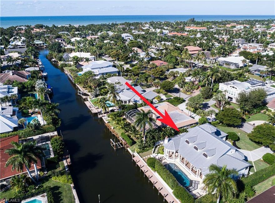 2021’s most wanted features come together with luxury and style in this waterfront home in prestigious Aqualane Shores. The 83’ dock lends quick access to Naples Bay & the Gulf waters beyond via your watercraft, while the private lanai and pool areas offer the perfect atmosphere for gathering with friends and family, indoors or out. This enviable location, with its sunny, southern exposure, is just a short distance from shopping & dining on historic Third St. S. and the Naples Pier. Famous 5th Ave. S. is only a few blocks more away!

The airy, inviting interior, with its expansive floor plan and striking design elements, features luxuries such as a climate-controlled wine room, a spacious butler’s pantry, Sonos sound, & controlled automation LED lighting.

The master bedroom is a dream retreat. Features include a light filled sitting area/study overlooking the pool w/egress to the lanai; dual water closets, indoor & outdoor showers, & extravagant walk-in closets. The second-floor bedrooms are also en suite and offer access to a coffee/morning bar & elevator to the main floor. An oversized and air-conditioned garage features a built-in workbench and cabinets.