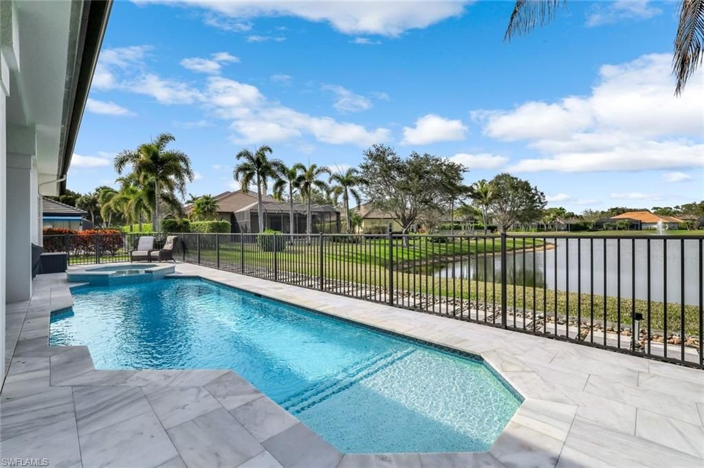 Photo of 9809 Rocky Bank DR, NAPLES, FL 34109 (MLS # 226008916)