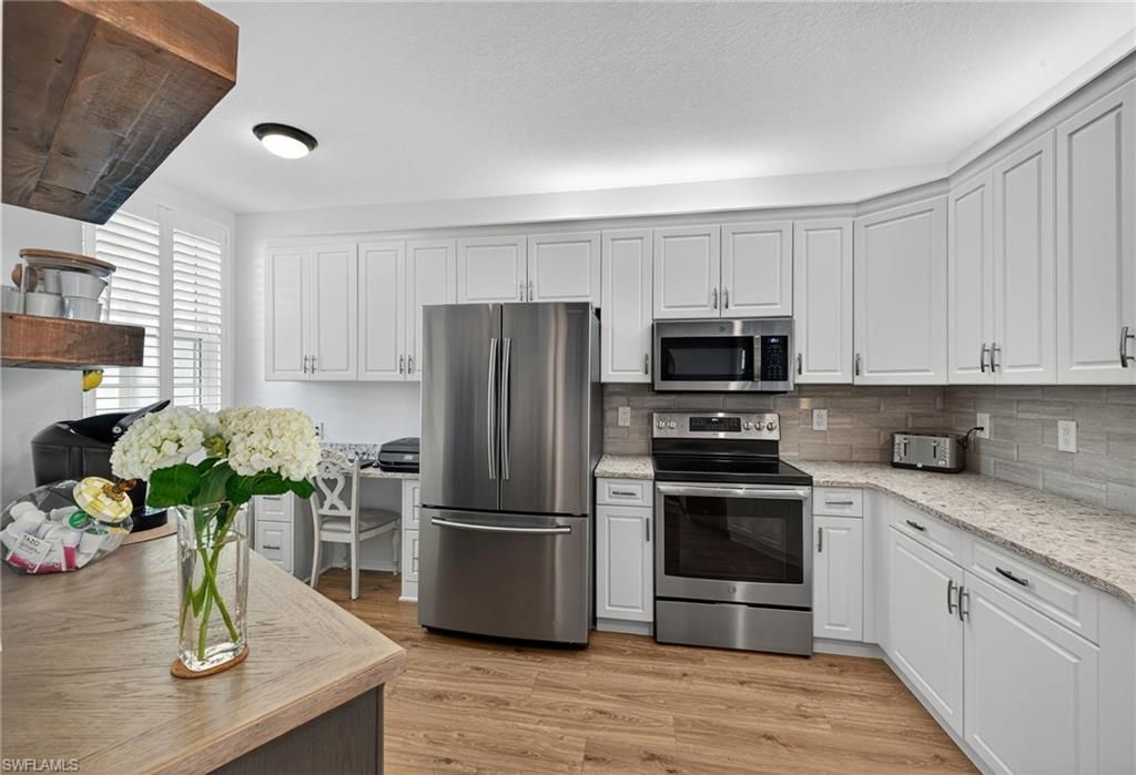 Photo of 8355 Excalibur CIR #L3, NAPLES, FL 34108 (MLS # 225083088)