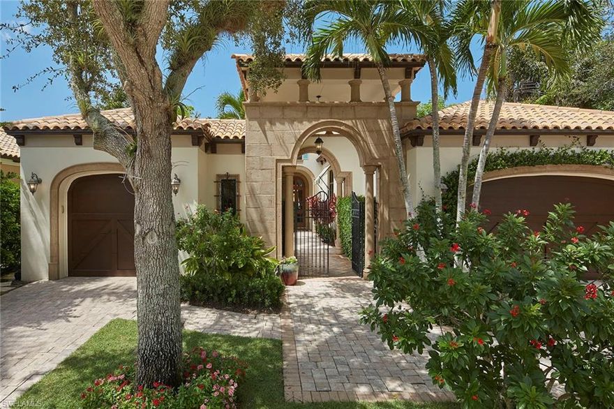 Immediate full golf membership eligibility. An incredibly luxurious home on a picturesque golf-to-lake homesite awaits you in the exclusive Marsh Wren neighborhood in Estuary at Grey Oaks. The open living plan features over 3,400 square feet including three bedrooms plus study, and three full and two half baths. A unique courtyard and grand mahogany glass front door greet you as you enter this opulent home with soaring ceilings, elegant trim detail and neutral stone flooring. The extended covered screened-in outdoor living area with bar, gas fireplace, updated pool and spa are perfect for enjoying Naples mild climate and the long-range view of the 16th and 17th holes of the Estuary golf course. The chef’s kitchen includes Viking and Sub-Zero appliances and two dishwashers. Additional features include a two-car attached garage plus a detached oversized climate-controlled golf cart garage, impact windows and doors throughout, and a private study with French doors and cherry wood flooring. A world of luxury awaits you within the updated, award-winning Grey Oaks Country Club community minutes from world-class dining and beaches of Old Naples.