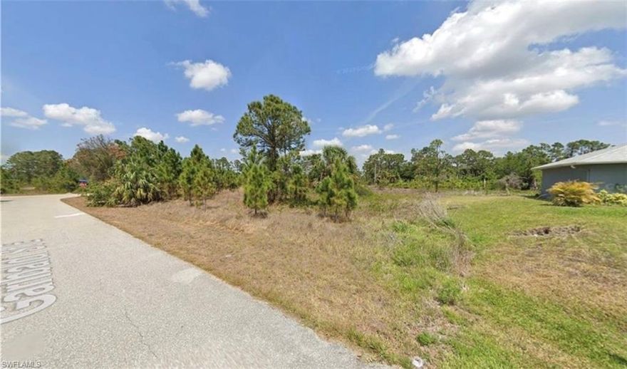 Inspection Report Available! Buildable lot in Lehigh Acres! No wetlands! Paved road! In front of new construction. Power pole available! Financing available with 50% down! Buy now and hold or build your home today! Practically no clearing required.