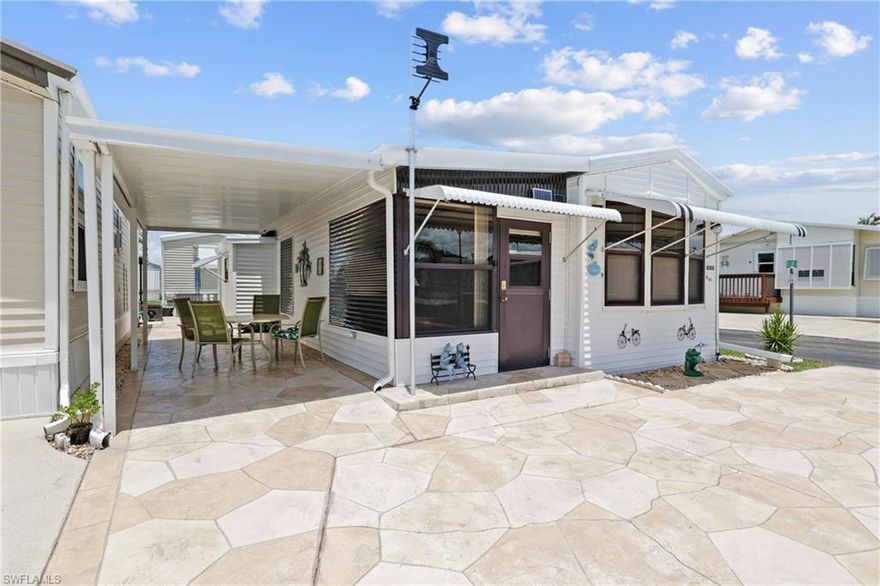 Beautiful 1 Bed / 1 Bath Mobile Home with Spacious Layout and Gorgeous Design Located on One of the Desired 2 Way Street Parts of Holiday Condo Park. The Property Features So Many Upgraded Features. The Covered Carport was Converted for additional Living Space Under Air.  There is Still a Carport That Can Be Used for Parking. The Roof is a Single Piece Aluminum Roof. The Plumbing Has Been Upgraded Throughout the Entire Home. The A/C Unit Has Been Replaced with All New Duct Work. New Laminate Floors Throughout. Kitchen Features Solid Wood Cabinets and Soft Closed Drawers, Stylish Backsplash, Custom Ceiling Design and a New 3 Door Refrigerator. The Windows Throughout the Home are Glass Windows and Many are Newer.  New Bahama Shutters Installed to Protect Those Windows Also. In the Covered Carport is a Laundry Room with New Washer and Dryer and an Additional Space Designed as a Workshop. There is So Much Storage and Perfect Use of Space in This Home Including Under Bed Storage in the New Bed, Built-In Bedroom Closets and a New Murphy Bed in Florida Room. The Place has Ample Parking Under the Carport and the Expansive Stamped Driveway. Holiday Condo Inc Boasts a Wide Range of Resort-Style Amenities, Including Both an Indoor and Outdoor Pool, Hot Tub, a Relaxing Sauna, Pickleball and Tennis Courts, Shuffleboard, Bocce Ball, and Horseshoes. The Community is Vibrant and Social, with Regular Activities and Events that Make it Easy to Meet Neighbors and Enjoy the Florida Lifestyle to the Fullest. Perfect for Year-Round Residents, Seasonal Snowbirds, or Investors, This Home is Located in a Pet-Friendly, Non-Age-Restricted Community Known for its Welcoming Atmosphere, Active Lifestyle, and Very Low Monthly Fees. This Home Offers Close Proximity to the Clubhouse and Indoor Pool. Hot Tub and Sauna. This is the Best Deal Considering Proximity to Fort Myers Beach. Schedule a Showing Today.