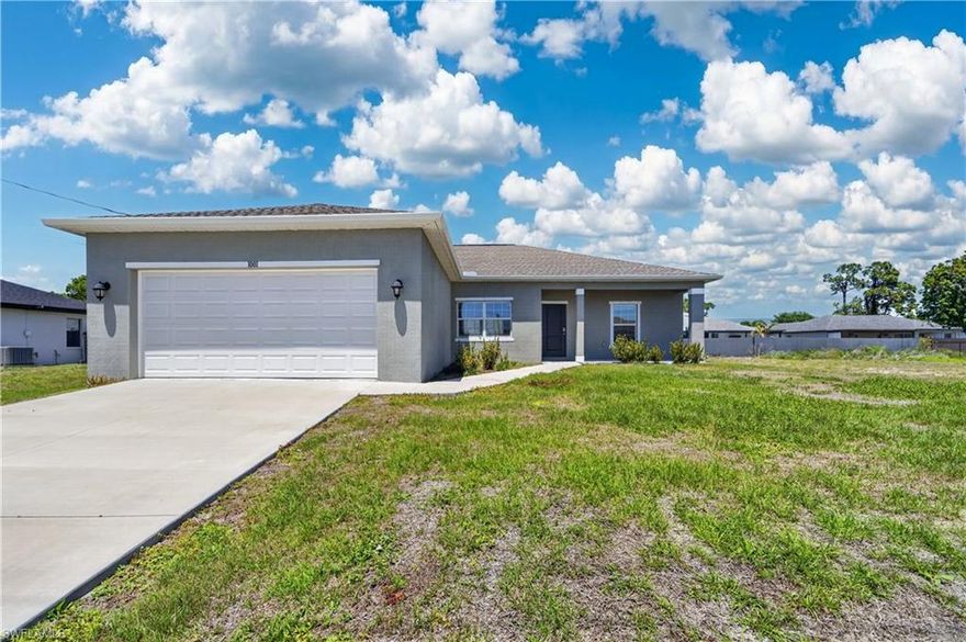 Built in 2022 and move-in ready, this Cape Coral gem delivers newer construction quality, a smart open floor plan, and an unbeatable location — all at a price point that is increasingly rare in today's market.
Offering 1,548 SF of well-designed living space within 2,345 Total, this 3-bedroom, 2-bathroom home with a 2-car garage checks every box for first-time buyers, growing families, investors, retirees, and snowbirds looking for a low-maintenance Florida residence.
Step inside to vaulted ceilings and plank luxury vinyl flooring that sets a clean, modern tone throughout. The kitchen is the natural heart of the home — featuring a center island with bar-top seating, granite countertops, white shaker cabinetry, a tile backsplash, stainless steel appliances, and a walk-in pantry. It opens directly to the living area, creating an easy, connected flow that works equally well for quiet evenings and casual entertaining. Just off the living room, a formal dining space offers flexibility — use it as a dining room, additional lounge area, or an open-concept home office.
The primary bedroom is generously sized and overlooks the private backyard. The en-suite bath features dual sinks, a walk-in shower, and his-and-her closets providing ample everyday storage. Two well-appointed guest bedrooms share a full bathroom with a combination shower and tub. An indoor laundry room with washer and dryer hookups adds convenience. Washer and dryer not included.
Out back, a large covered lanai under truss is ready for weekend barbecues, outdoor dining, and relaxed Florida living. The yard offers plenty of room to add a pool in the future — a blank canvas for the outdoor space you've always wanted.
Situated in the Gator Circle area of North Cape Coral, you are close to schools, a growing number of gated communities, shopping, dining, and Cape Coral's VA Medical Center. Commuting is easy with convenient access to Fort Myers, Charlotte County, and Pine Island Road.
And the future of this corridor is exceptionally bright. Cape Coral Grove — a 131-acre mixed-use town center — is projected to bring upscale retail, dining, hotels, public parks, and community events, with an economic impact of over $1.3 billion. The Seven Islands project will add restaurants, boutique shops, a marina, green space, and potentially a beach area to the northwest Cape. The Pine Island Corridor continues to grow as one of Cape Coral's most popular dining and lifestyle destinations. Buying here now means getting ahead of it all.
2022 built. Move-in ready. Low-maintenance. High-growth location. This is the right home at the right time.