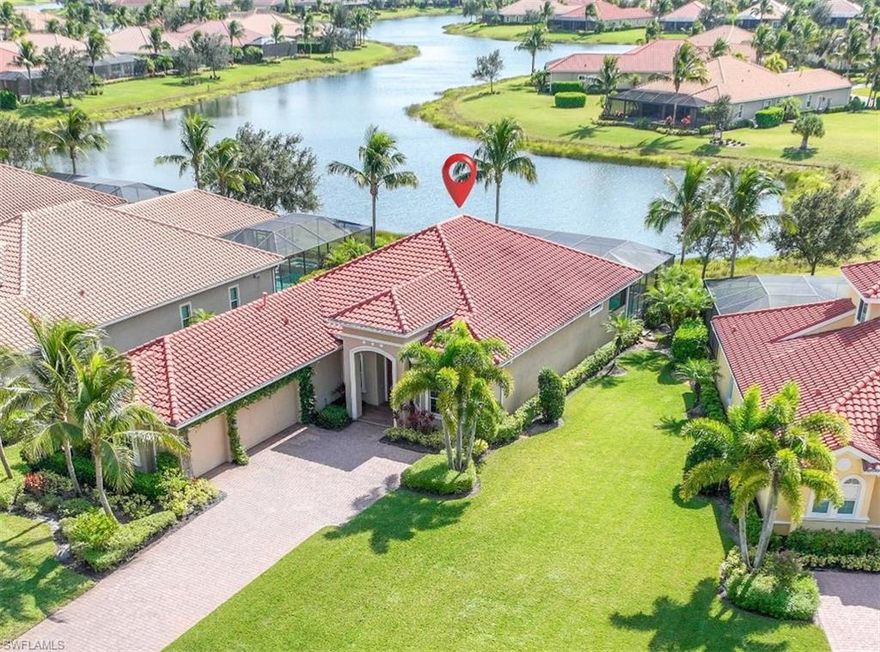 Fabulous opportunity to own an extensively upgraded lakefront home in Chiasso at Fiddler's Creek. TURNKEY FURNISHED. CAPITAL PORTION OF CDD PD IN FULL! A beautiful fountain welcomes you home to the Chiasso neighborhood which is privately tucked into the natural setting of Fiddler's Creek. Large front lawn and nature preserve across the street. Long south facing lake views. Enjoy the tranquil setting from the extended and elevated pool deck. Offered turnkey with designer furnishings from Alison Craig, Arhaus, and Ebel. The desirable southern exposure allows for sun on the saltwater pool and spa throughout the day. Open great room plan with all of the right attributes. 12ft+ ceilings with celing inlays. 8ft solid core interior doors. Hunter Douglas window coverings. Chef's kithcen with butler pantry and wine cooler. Whole home water filtration and UV A/C light. Three car garage, dedicated pool bath, impact glass, travertine and wood floors throughout, private bedrooms with custom closets, and much more. Home also features natural gas cooktop, pool/spa heater, outdoor kitchen grill, water heater, and dryer. Don't miss this one.