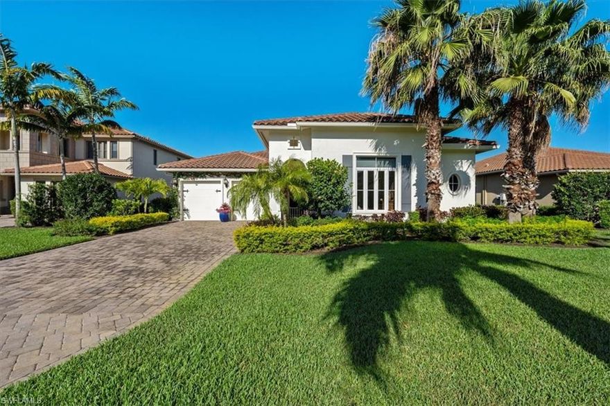 IMMEDIATE GOLF MEMBERSHIP AVAILABLE.  Situated on a deep lot with west facing pool embraced by lush hedges, this house will immediately captivate you.  Drenched in natural light,  and awash in custom detail, it exudes a warm, coastal sophistication.  The open great room floor plan features a wall of glass overlooking the pool, spa and lake.  Off the great room is a bright kitchen with quartz counters, a beamed ceiling and a huge island.  There’s a gracious dining room and a sound insulated den with double doors - perfect for the movie enthusiast.  There are custom ceiling treatments and crown moldings throughout which compliment the French oak floors.  The large owner’s suite is complimented by a beautifully appointed bath and ample closets.  There are two additional guest bedrooms with walk in closets, both en suite.  A custom outdoor kitchen completes the offering.  This home is being sold furnished, golf cart included.