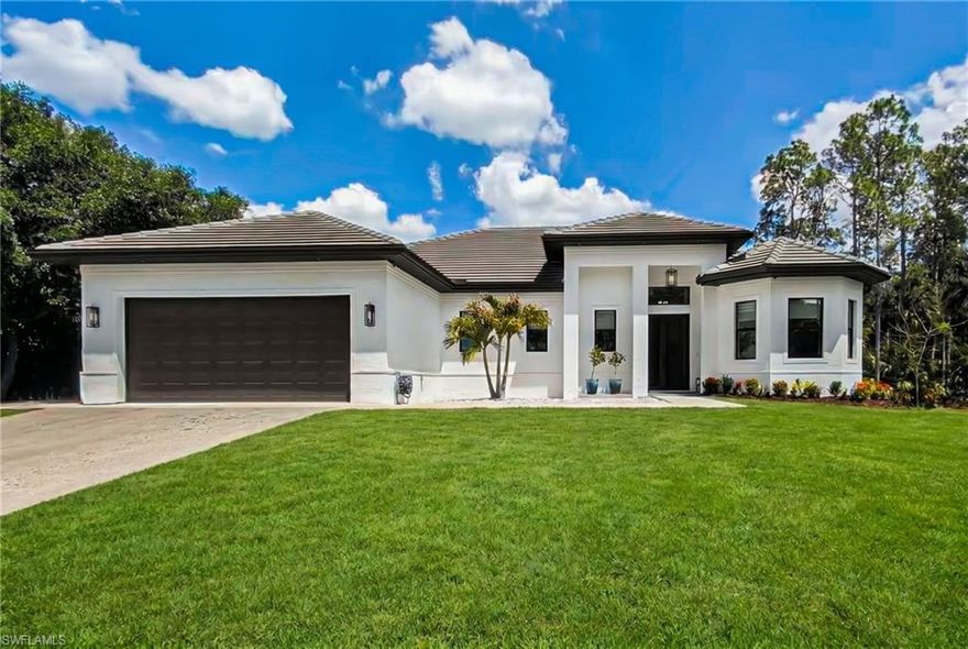 Experience the ultimate blend of modern sophistication and tranquil privacy in this breathtaking Naples retreat, built in 2022. Set on a sprawling 2.5-acre lot, this single-family home offers endless possibilities—whether you dream of adding a guest house, creating a sports court, parking your motorcoach, or finding the perfect space for boats and ATVs. Here, there’s room to make your vision a reality. Inside, the home is a masterpiece of thoughtful design. With 4 spacious bedrooms with ensuite bathrooms, a versatile bonus room, and a cozy den, there's a perfect space for every need—whether it's work, relaxation, or play.  The Kitchen is truly the heart of this home with dual refrigerator/freezers, two dishwashers, and a large island for gathering. The great room plan flows through pocketing sliders to the outdoor living space with an outdoor kitchen and a stunning pool, ideal for soaking up the warm Florida sun on the sunshelf or hosting unforgettable gatherings. Got laundry, no problem-- this home boasts two laundry rooms, one off the main living and a second in the pool bath. Added features are a whole house generator and whole house reverse osmosis system.
Though this property offers peaceful seclusion,  you are a short walk away from the Max A Hasse community park &  just a short drive to Naples’ vibrant shopping, dining, and entertainment scene. Whether you’re in the mood for a quiet evening at home or an exciting night out, this home delivers the best of both worlds. Your private Naples oasis awaits—don’t let it slip away!