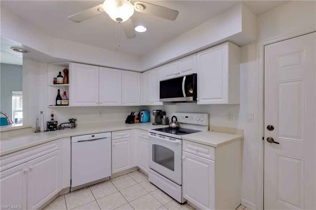 Photo of 25080 Peacock LN #102, NAPLES, FL 34114 (MLS # 226017709)