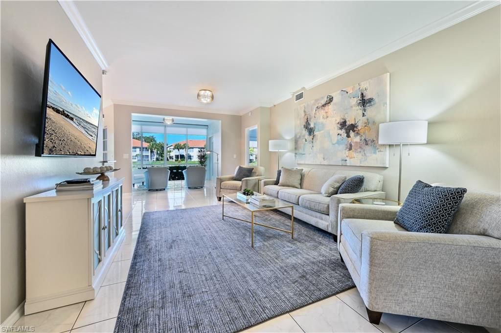 Photo of 1054 Egrets Walk CIR #102, NAPLES, FL 34108 (MLS # 226017111)