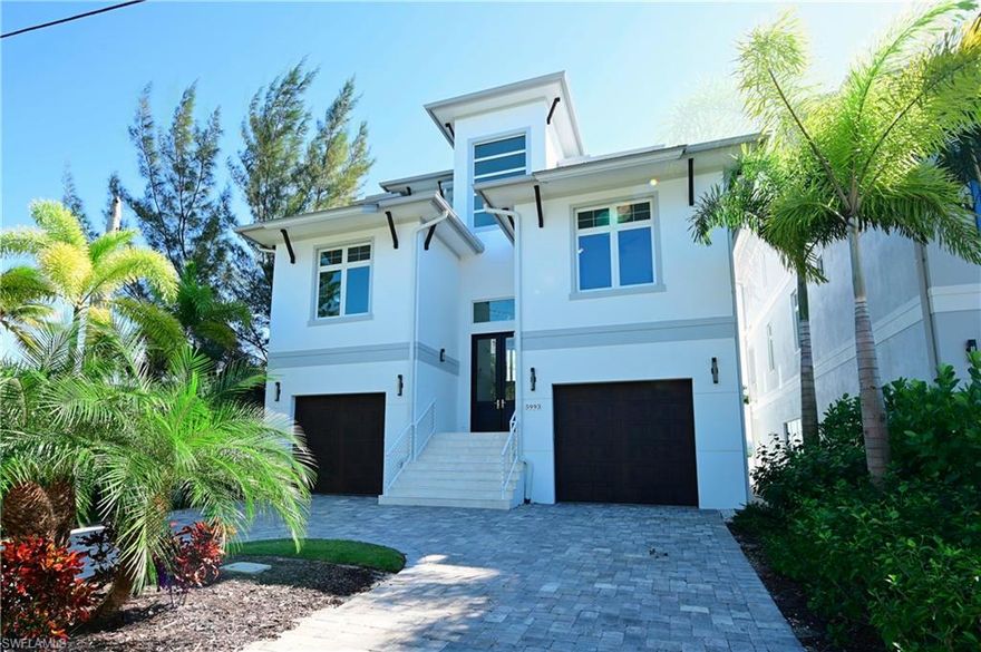 This all new direct bayfront home offers 5 bedrooms & sweeping bay views. Property offers both immediate beach and Gulf access as well as a unique southern exposure setting that overlooks a gorgeous section of bay & main boating channel. The main level of this home features an open kitchen w/thick bevel quartz tops, 48" wolf range, & sub zero refrigeration w/butlers pantry  The grand living room offers full wetbar w/refrigeration. The wall of glass sliders opens to a bayfront lanai w/gas fireplace, room to lounge & stairs to the pool deck. The master suite features a coastal trim package w/nickel gap paneling, tongue & groove, & wood beams. The master bath offers his/her vanities, soaking tub, & glass shower. The guest suites of this home are well appointed all with uniquely selected en suite bath setups. Both living levels of this home offer full laundry rooms. This property includes an oversized dual garage as well as private elevator. The pool offers sun shelf & elevated spa. This home is constructed to the latest hurricane codes. Beach access is across the street on Hickory Blvd. Boaters can utilize Big Hickory Pass around the corner or Wiggins Pass to the South.