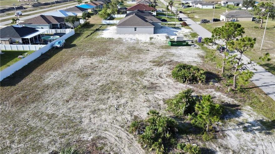 TRIPLE LOT - LOTS 26 THRU 28. Vacant land in rapidly developing area. Minutes from coral oaks golf course, and Matlacha. Conveniently located close to shopping, fire station, boat ramp, schools, Southwest Florida International Airport, and world-class beaches.