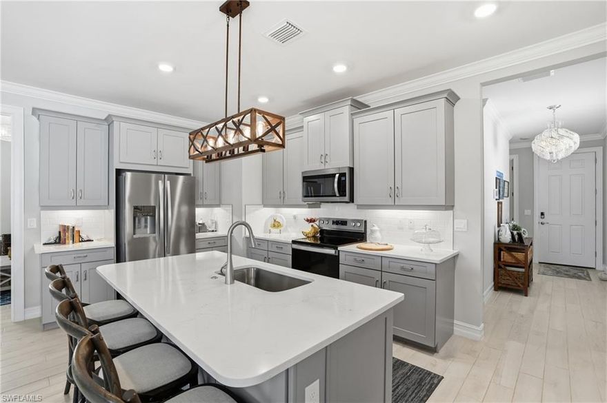 Welcome to the highly desirable Jennings floor plan in the gated community of Seasons at Bonita. This home has been substantially upgraded and shows like a model, offering both comfort and style. Inside, you’ll find elegant plantation shutters paired and automatic blinds, creating a polished look while maximizing natural light and privacy throughout the home. The open living space flows seamlessly to the outdoors, where a fully equipped outdoor kitchen and fenced-in yard make this home ideal for entertaining, pets, or simply enjoying Florida living year-round. Additional highlights include the peace of mind of not being located in a flood zone and low HOA dues, making this property as practical as it is beautiful. Seasons at Bonita is known for its exceptional resort-style amenities, including pickleball, tennis and bocce courts, fitness center, lap pool, resort pool, and two dedicated dog parks. Ideally located near shopping, dining, and Gulf beaches, this home offers the perfect blend of upgrades, lifestyle, and value!