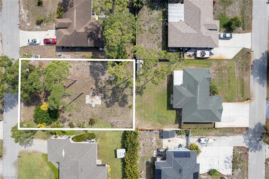 Discover the potential of this prime vacant lot located at 18250 Oak Rd in San Carlos Park. Just under a quarter acre, this property offers endless opportunities to bring your vision to life. Whether you're looking to build your dream home, secure an investment property, or create your own private backyard oasis, this lot provides the ideal foundation. Conveniently located just minutes from Southwest Florida International Airport (RSW), Florida Gulf Coast University (FGCU), and a wide variety of shopping and dining options, this is a rare chance to own land in a rapidly growing area.

Please note: The single-family home located directly behind this lot is also being offered for sale separately.