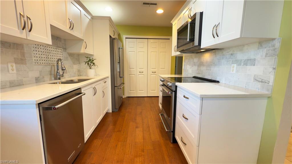 Photo of 7095 Pond Cypress CT #6, NAPLES, FL 34109 (MLS # 225033574)