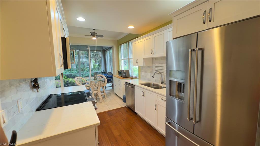 Photo of 7095 Pond Cypress CT #6, NAPLES, FL 34109 (MLS # 225033574)