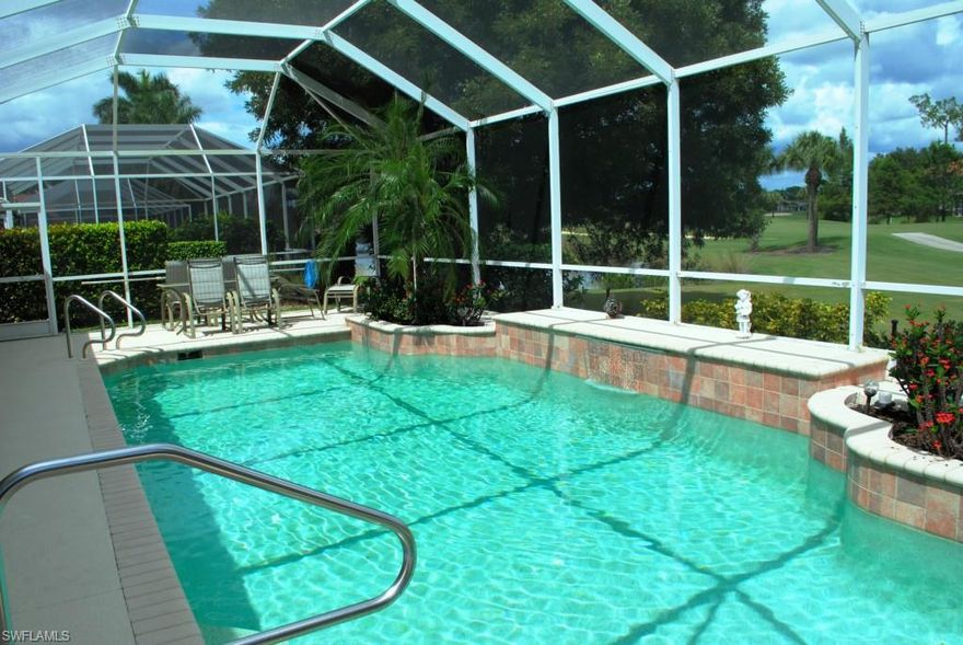 Beautiful Estate Home with long Fairway and Lake views and a LOW $35YR HOA!  Great floorplan and do updates to kitchen and baths and make it your own.  Swim laps in a 30ft Pool with waterfall & plantings.  Entertain and enjoy sunny Florida outdoor living in an oversize Lanai, plus a large under-roof covered area and collapsing sliders.  New LENOX AC system is state-of-the-art to remotely set & track from afar -- Newer Refrigerator.  3 Screened Lanais...with one for a relaxing morning coffee or grilling, just steps from a large Eat-in kitchen, with Center Island and Pantry.  Eat fruit from your own trees!  Includes deeded FULL GOLF membership.  Clubhouse features Restaurant, Bar, Library, Billiards, Card Rooms.  Active with Golf & Tennis, Fitness gym, classes, events & more!  Location 1 minute to all conveniences out front & back gate.  Only 4mi to downtown Olde Naples, beaches, dining, shops & all Naples offers!  Peaceful setting.  Your Lifestyle living for full or part time.