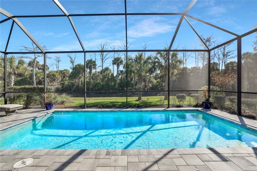 Welcome to your dream home in the beautiful community of Greyhawk, where luxury and tranquility meet! Nestled within a gated community brimming with amenities like a golf course, state-of-the-art fitness center, restaurant, tennis courts, pickle ball, and bocce ball, this newer built (2022) property seamlessly combines comfort and style. Enjoy the perfect blend of indoor and outdoor living with an expanded open floorplan highlighted by custom finishes, designer window treatments, lighting fixtures, and ceiling fans. The spacious kitchen is a cook's delight, featuring stainless steel appliances and a natural gas range. Relax in your screened-in lanai and pool while soaking in the serene preserve views, all situated on an oversized lot with ample parking. You're just minutes away from upscale shopping and dining at Founders Square, Galleria Shoppes at Vanderbilt, Mercato, and the renowned Naples beaches. Impeccably maintained, this home offers the perfect private setting for a lifestyle of ease and elegance.