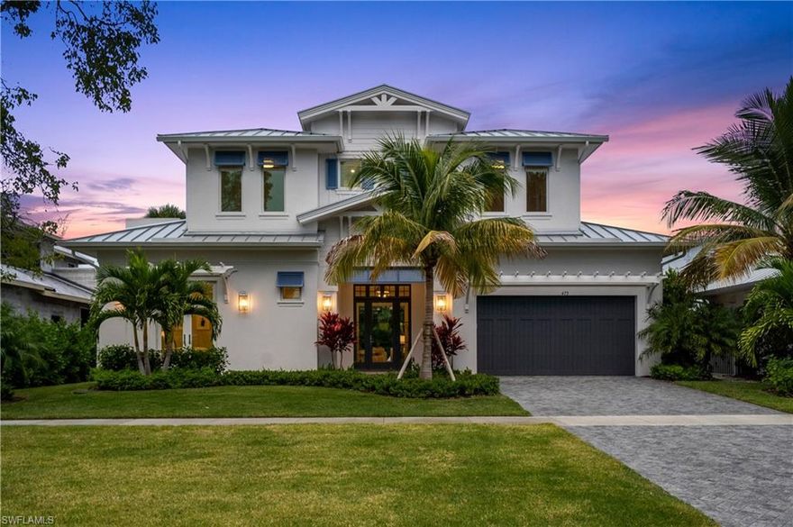 This brand new custom estate designed by Boyatt design and built by DIVCO is situated in a prime location in Olde Naples. Built with sleek elements and an open floor plan design makes this a sought-after gem in the Naples area. Rooms are spacious, and include 5 bedrooms, 5.5 bathrooms, all spread over 3,240 square feet under air and 4,872 square feet total. Upgrades and other room notables are only fitting for a home of this magnitude, and include a modern staircase, 2 sets of pocket sliders, detailed crown moldings and base boards, wood coffered and tray ceilings for added appeal, gourmet kitchen with stainless steel appliances and triple tier custom cabinetry with glass inserts, custom tile and wood flooring, and pocket sliding doors that help bring the outdoor beauty in. The upstairs includes a wet bar with 3 ensuite bathrooms. The lanai is a true retreat, with a large pool and spa, an outdoor kitchen with a BBQ, a large seating area with a pergola, and lush tropical landscaping. This home is within walking distance to 5th Avenue for dining, shopping and the spectacular Naples beaches.