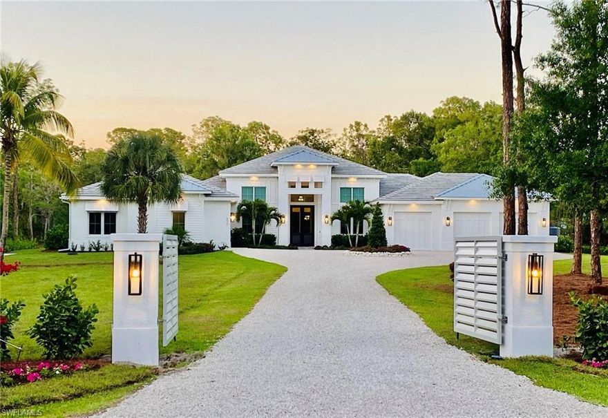 Welcome to this 2020 construction custom built, modern coastal one-story estate home situated on 2.74 acres in one of the best lots in Livingston Woods! This home was built to the highest standards with 7 bedrooms, 6 ½ bathrooms, and 4 oversize garages with 2 high lift bays, and includes a two-bedroom, two-bathroom guest suite with separate entrance, garage, lanai, security zone, laundry and full kitchen.  The house includes wide-plank European oak wood flooring, 11 to 18 ft. detailed ceilings, custom molding, wolf & subzero appliances, a butler’s pantry with its own dishwasher, sink and beverage center, an upgraded security system, smart home with CAT 6 wiring, control 4, power blinds, and wired speakers throughout. The master retreat includes two custom master closets with its own washer/dryer, a large soaking tub, and oversized custom shower.  Designed for Florida living, the interior living spaces blend with the outdoor living areas through glass sliders and power bug screens. This home is hurricane proof with all impact windows and doors and a whole-home generator (1,000 gallon propane tank). Pictures do NOT include recent updates to landscaping, new columns, and front gates.