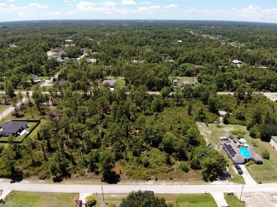 Beautiful 1/2 ACRE lot close to Joel Blvd and Richmond Ave in Lehigh Acres with many new construction homes in the area! Ideal for you to build your dream home! Located in Flood Zone X which means NO flood insurance required by a lender when you build.