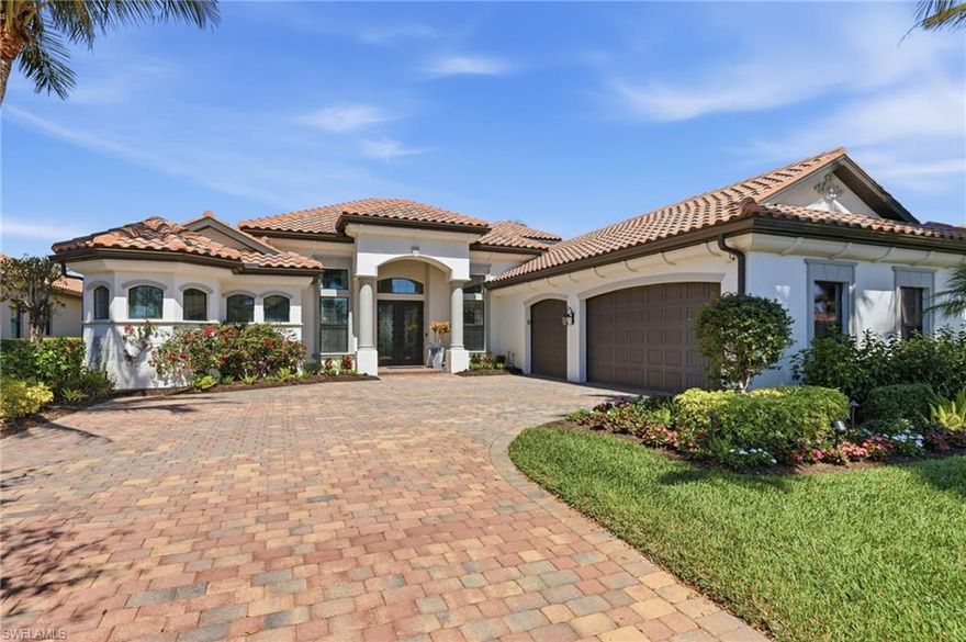 Classic Mediterranean architecture meets modern Florida coastal design in this beautifully updated home located on Runaway Bay in the highly desirable Fiddler’s Creek community. Enjoy stunning long water and golf course views from the home’s expansive lanai, perfectly positioned with a northeast rear exposure offering soft morning light and beautiful evening sky colors. This light-filled residence features over 3,600 square feet of living space with 4 bedrooms + den and 4 full baths, thoughtfully designed for both everyday living and entertaining. The newly remodeled chef’s kitchen showcases a Wolf range, high-end stainless steel appliances, custom cabinetry with oversized drawers, reverse osmosis water filtration, under-cabinet lighting, and striking quartzite countertops that continue seamlessly into the backsplash for a clean, sophisticated look. Step outside to the expanded resort-style lanai featuring salt water pool with newer heater and pump featuring water falls and sun shelf, spa, and a fully equipped outdoor kitchen with gas grill, dual refrigerators, bar seating, and custom cabinetry—creating exceptional outdoor entertaining space. Additional features include mosquito misting system, hurricane shutters and impact windows and doors. A rare second-floor retreat adds incredible flexibility with a wood staircase leading to a private, spacious living area or 4th bedroom featuring a balcony with water and golf views, full bath, and wet bar with mini refrigerator.  The primary suite enjoys peaceful water views and includes dual closets, a large walk-in shower, soaking tub, and dual vanities. Additional highlights include designer lighting, custom window coverings, surround sound, central vacuum, tray ceilings, extensive moldings and trim throughout and new HVAC system (2024). Even the three-car garage is immaculate, complete with custom storage, sink, insulated garage doors, and AC mini split. A perfect blend of timeless architecture, modern updates, and spectacular views in one of Naples’ most sought-after communities. Fiddler's Creek, is an award-winning private community that offers luxury residences and resort-style amenities amidst a beautiful tropical backdrop. The 54,000 sq ft Club & Spa features two on-site restaurants, pools, a fitness center, as well as tennis, pickleball, and bocce courts. Optional memberships for golf, beach, and boating are also available. Conveniently located just minutes from the beaches of Marco Island, 5th Avenue, and a myriad of shopping and dining choices.