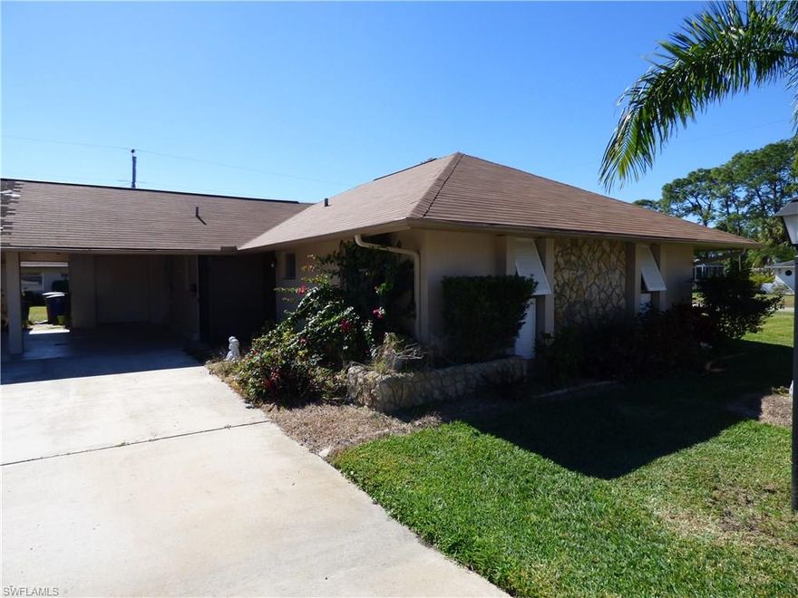 Plenty of privacy on end of street, corner end unit, plenty of open spaces, automatic garage door for golf cart access to storage/laundry room/workshop, newer ceramic tile floors throughout with carpet in the bedrooms only, two archways lead to open 23 X 16 family room under central air, newer appliances in kitchen, pantry, bright and white throughout, master bedroom with dual closets, built in storage cabinet and private bath with walk in shower, 6 ceiling fans, screened front entryway, pull down stairs to attic for storage, open patio in yard, covered carport parking with driveway for two cars, new wall to wall carpet just installed in both bedrooms, new electric panel box installed Oct 2016, New flat deck roof in 2014 and new main shingle roof just installed in Oct 2016, excellent move in condition, 55+ community, pets OK, walking distance to stores, etc.