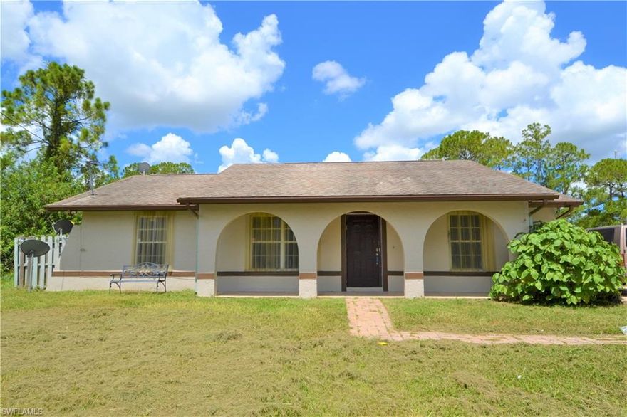 3/2 Single Family Home in West Lehigh - Open front porch leads into a comfortable living area with dining nook.  Sliding glass doors open to a large covered lanai.  Updated Kitchen & Bathrooms. Freshly Painted and Newer Fixtures.  Split floor plan with Renovated Master Bedroom & Bath. Huge backyard on a Canal. Located on a dead-end street with ample parking.  Newer homes next door in a beautiful neighborhood.  Quick commute to I-75 & Fort Myers - Ready to Move-in!