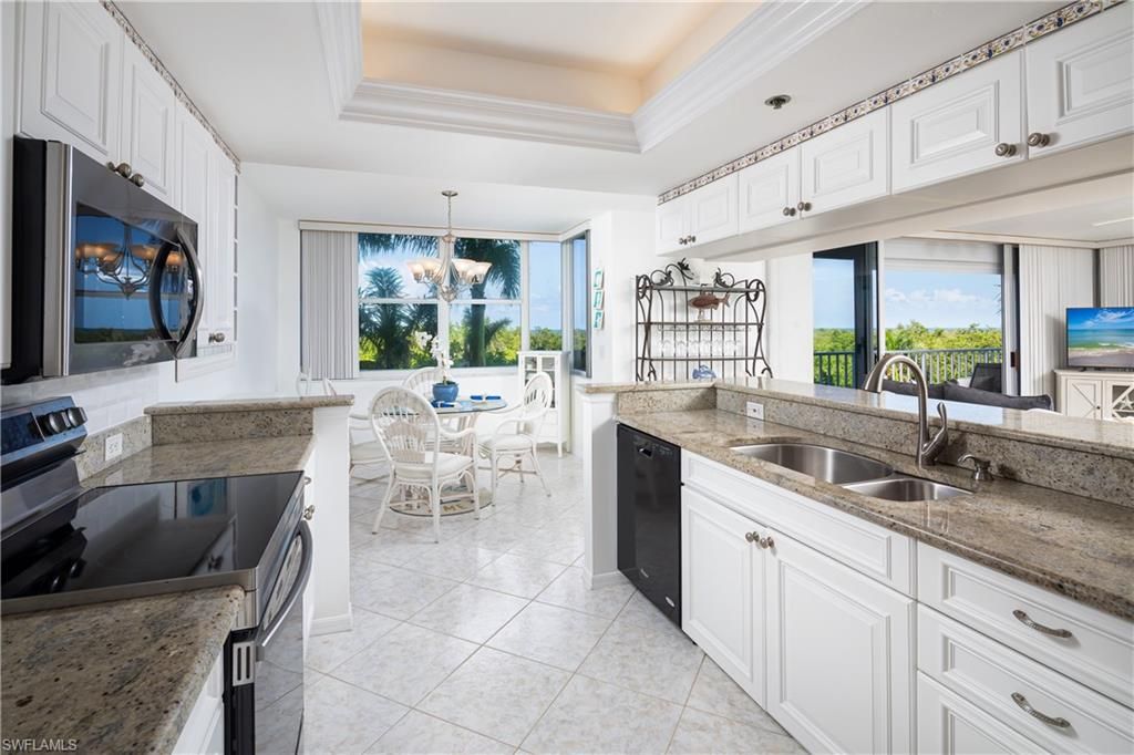 Photo of 5550 Heron Point DR W #305, NAPLES, FL 34108 (MLS # 225052423)