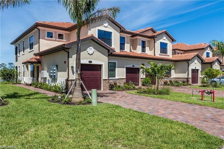 Take in stunning sunsets overlooking the expansive lake with a sparkling fountain. This second-floor end unit has lots of natural light. 3 bedrooms and a den with double doors.  Beautifully appointed with 42” upper kitchen cabinets, granite countertops, and stainless steel appliances. Beautiful kitchen and spacious pantry.  Join the fun at Paloma's many amenities which include a resort-style pool, tennis courts, fitness center, bocce court and clubhouse with events, parties & activities such as water aerobics, poker night, group luncheons and more. This gated community offers desirable low fees, a maintenance-free lifestyle and a great location west of 75. Close to shopping, dining, Coconut Point, The Promenade, Hertz Arena, FGCU, the beautiful beaches of the Gulf and the international airport. A great buy!