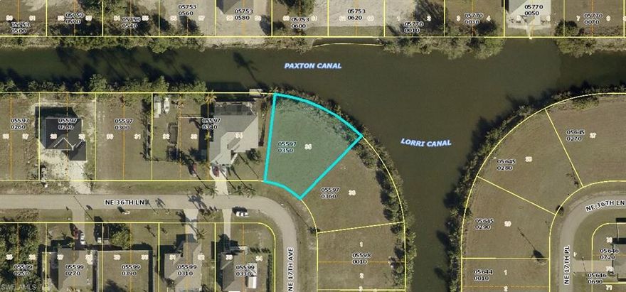 Great tip lot available with wide intersecting canalfront views!! The lot next door is also available for sale to make it a double tip lot with extra wide water views.
