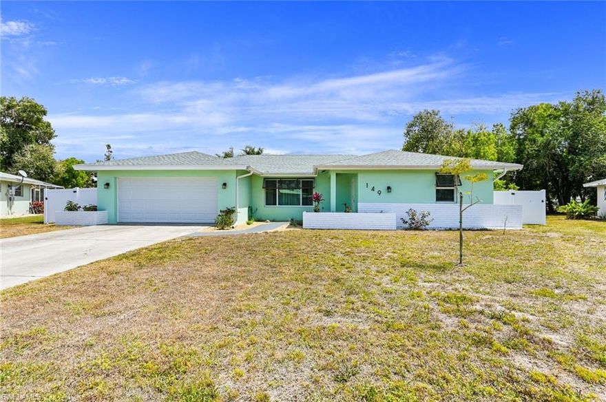 A rare find in Naples, this beautiful home is the perfect blend of style, quality updates, location and affordability all wrapped up in Florida charm!   This home showcases two well sized bedrooms (master is en-suite) two full baths with new vanities, entertaining sized living room and dining room just waiting to host family and friends, bright, updated kitchen and a family room that actually can hold a family! The laundry room offers generous storage options and a pass through to the two car garage. The living room and family room both open to a picturesque, screened lanai that overlooks a securely fenced yard with sweeping golf course views and sunsets not to be missed! This home offers a new roof and new impact resistant windows to round out this unmatchable value, all conveniently located to all that Naples has to offer!  This house is ready to be called home!