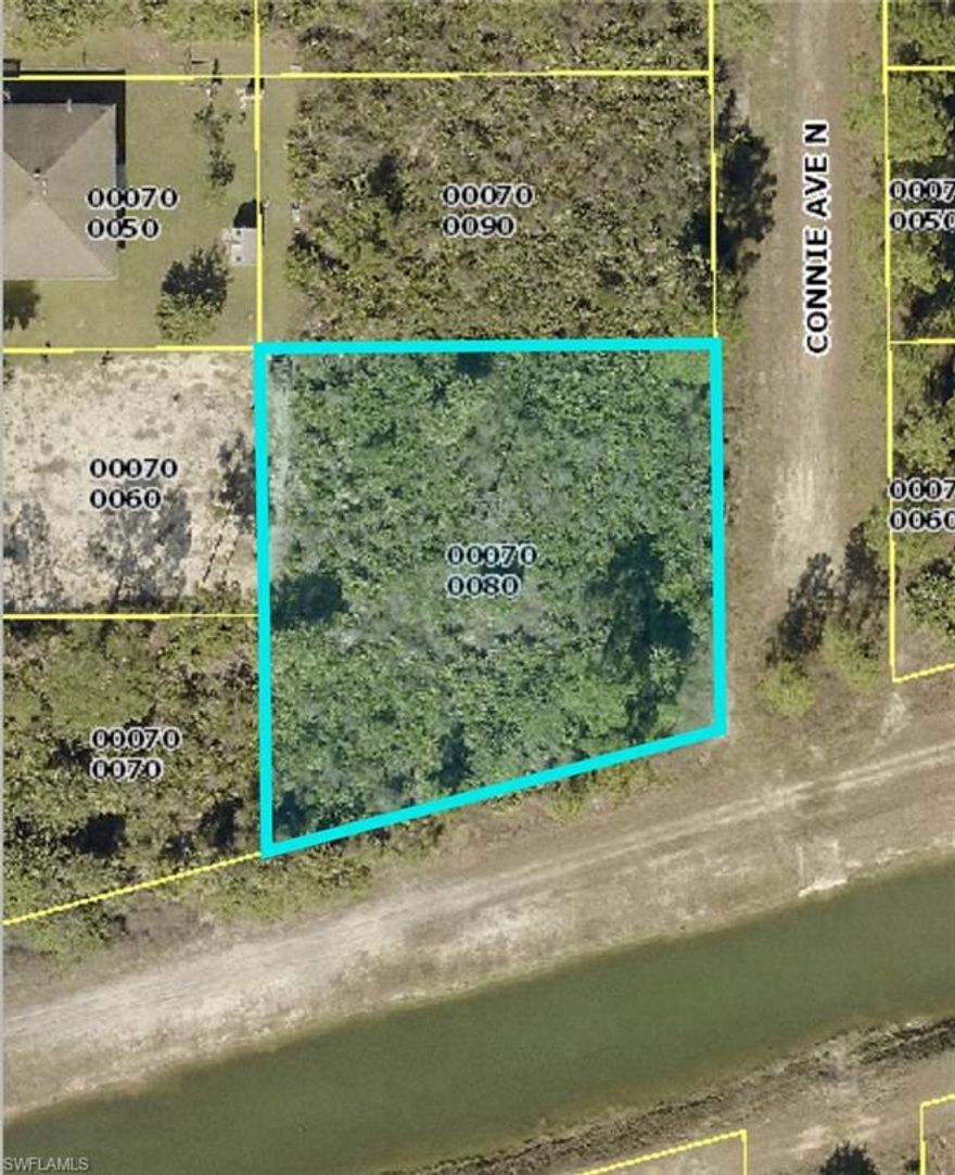 Oversize lot on a quiet road.  Almost 1/2 acre lot situated at end of street and adjacent to canal -  no through traffic!  New homes going up all around this area.  Don't miss this one!