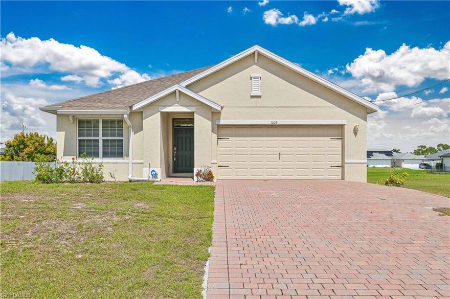 Welcome to this beautiful 3-bedroom, 2-bathroom home with a 2-car garage, built in 2022 and located in desirable NE Cape Coral. This well-maintained home offers a modern layout with tile flooring throughout the main living areas and comfortable carpet in the bedrooms. The home comes partially furnished and is move-in ready, making it a convenient option for tenants looking for an easy transition. The open living and dining areas provide a bright, spacious feel—perfect for everyday living and entertaining.
Rental Details:
Rent: $1,850/month. First month’s rent and one-month security deposit required. Tenant responsible for all utilities and lawn care. One small dog allowed with $400 non-refundable pet fee. +625 credit & 3x income. Available on short notice. Enjoy the comfort of a newer home in a growing area of Cape Coral, with easy access to shopping, dining, and everyday conveniences. Schedule your showing today—this home won’t last long!