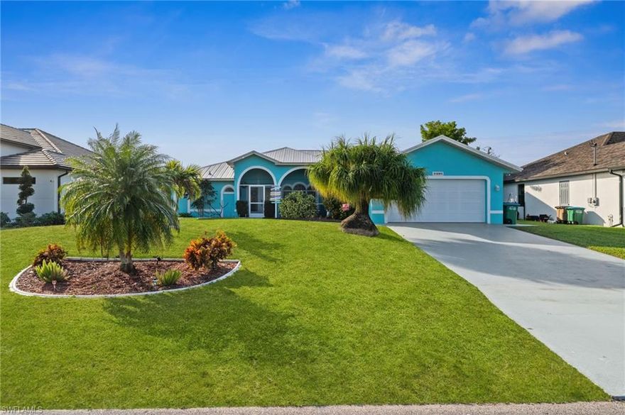 Sun on your skin, water out your window, and the feeling that life just got lighter,  this Southern-exposure, beach-style canal home is pure Florida joy. In one of Cape Coral’s most desirable neighborhoods, just a short walk to Palmetto Pine Golf Club, every detail here leans into sunshine, lifestyle, and that "vacation-every-day" energy.

The moment you enter, the home opens up with brightness, coastal light pouring through, guiding you to the standout feature of the living space: a warm, inviting family room overlooking the peaceful canal. It’s the kind of view that slows your breathing, pulls you outside for sunset, and makes you grateful for where you are. Morning coffee tastes better here. So do long weekends, pool days, and unplanned evenings with friends.

Powered by solar, your LCEC bill stays around $25/month, letting you enjoy comfort without the cost. A metal roof, impact-resistant windows, and solar-heated pool give long-term confidence and effortless, year-round enjoyment. Everything is well-kept, cared for, and ready for someone who wants more than a house,  someone who wants a life they’ll love living.

This home doesn’t just offer Florida living,  it delivers a feeling. Bright, easy, sunny, and alive.