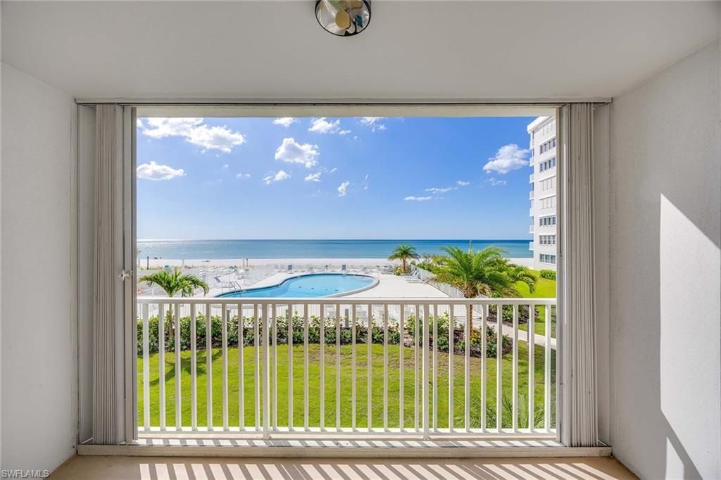 Photo of 3443 Gulf Shore BLVD N #207, NAPLES, FL 34103 (MLS # 225076330)