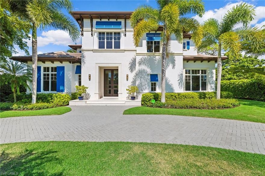 Located in the highly sought-after Palm Circle neighborhood, this classic West Indies-style home is a short four-block bike ride or walk to the beach. Designed by Stofft Cooney Architects, this residence features spacious open living areas and a large gourmet kitchen with custom cabinetry. This smart home is outfitted with cat-5 ethernet and RG-6 coax cables throughout, featuring Nest, Ring and myQ systems, as well as a monitored security system. In addition, the neighborhood has recently been upgraded with fiber optic cables. The primary bedroom and den are situated on the first floor, while three additional en-suite bedrooms are located on the second level with their own private lounge area. Wide-plank oak floors in driftwood gray are featured throughout the home. Walls of French doors provide seamless access to the private, tropical backyard with a saline pool and spa, along with a covered outdoor living space, including a built-in kitchen/grill with automated screens and shutters. This stunning property provides the perfect resort-style experience in the heart of Old Naples with close proximity to Fifth Avenue South and Third Street South.