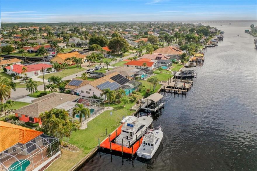 DIRECT ACCESS!!! LOCATION!!! LOCATION!! 5 minutes straight down your canal to the river, Lido Canal, ATTENTION BIG BOATERS!!! This is it ! Large Captains walk dock for a 50ft boat, New Roof 2021, 3/2 split plan layout, large master bedroom with walk in closet & updated bath, Breakfast bar granite kitchen, sliders out to your stamped concrete screened tropical heated pool oasis, that over looks a 50 ft. Captains walk dock for all your boating needs, this home offers the ultimate Florida setting & VIEW Don't miss this property, definitely a  must see home for the money & Location, also a great Site to Build the home of your Dreams!! Won't last long!!!!!