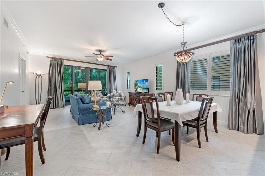 Photo of 1035 SANDPIPER ST #F-104, NAPLES, FL 34102 (MLS # 226013596)