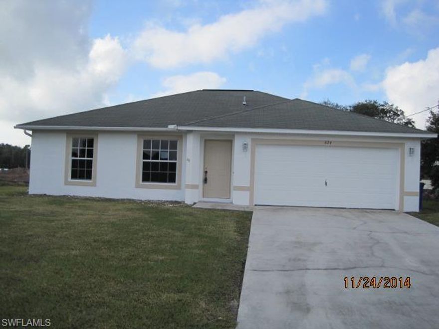 Freshly painted 3 bedroom 2 bathroom 2 car garage home. The home features an open kitchen, new carpeting throughout, and a rear screened lanai under truss.  A must see on .55 acres on a quiet street.