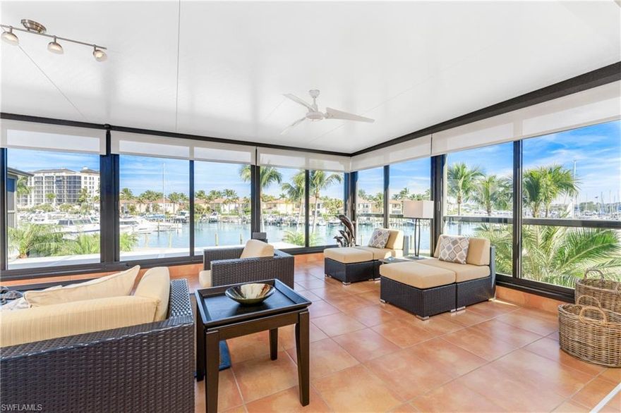 Wake up to sweeping marina views and front-row seats to Burnt Store Marina’s lively south basin from this beautifully updated three-bedroom waterfront condominium. Positioned directly on the south marina basin, this residence offers a rare opportunity to enjoy the vibrant boat activity, glowing sunsets, and a constantly changing waterfront backdrop from the comfort of home. The expansive enclosed lanai is the showpiece of the property, and no doubt will be your favorite gathering spot with family and friends! It seamlessly connects with the rest of the residence with the captivating panoramic views while providing a relaxed, open-air feel when the impact-rated sliding doors are opened to welcome in tropical breezes. It’s an ideal setting for morning coffee, sunset cocktails, or entertaining guests against the vibrant marina scenery. This thoughtfully remodeled condo features tile flooring and plantation shutters throughout with a cohesive coastal palette. The kitchen is both stylish and functional, featuring updated cabinetry, quartz countertops, stainless steel appliances, tumbled stone backsplash and modern fixtures, A custom built-in bar and entertainment center add character, storage, and convenience— perfect for hosting or everyday living. Both bathrooms have been tastefully updated with coordinating cabinetry and countertops, along with refreshed showers featuring frameless glass enclosures and a new water heater. Generous walk-in closets and abundant cabinetry provide excellent storage, complemented by an oversized one-car garage offering even more space. Offered fully furnished, this condo allows for immediate enjoyment or a seamless transition into seasonal or full-time marina living. Monthly condominium fees include fiber-optic cable and high-speed internet, water, sewer, A/C maintenance, and more. Located within the private, gated Southshore enclave, residents enjoy an intimate waterfront setting with inviting outdoor gathering areas, a heated community pool, and clubhouse—all just steps from your door. This complex has been fully updated with new roofs, paint, walk ways and many other capital improvements. This is marina-front living at its finest, combining comfort, convenience, and an unmatched waterfront lifestyle. Burnt Store Marina residents enjoy access to resort amenities including two on site restaurants, a public golf course, tennis and fitness, and a deepwater marina right in your back yard!