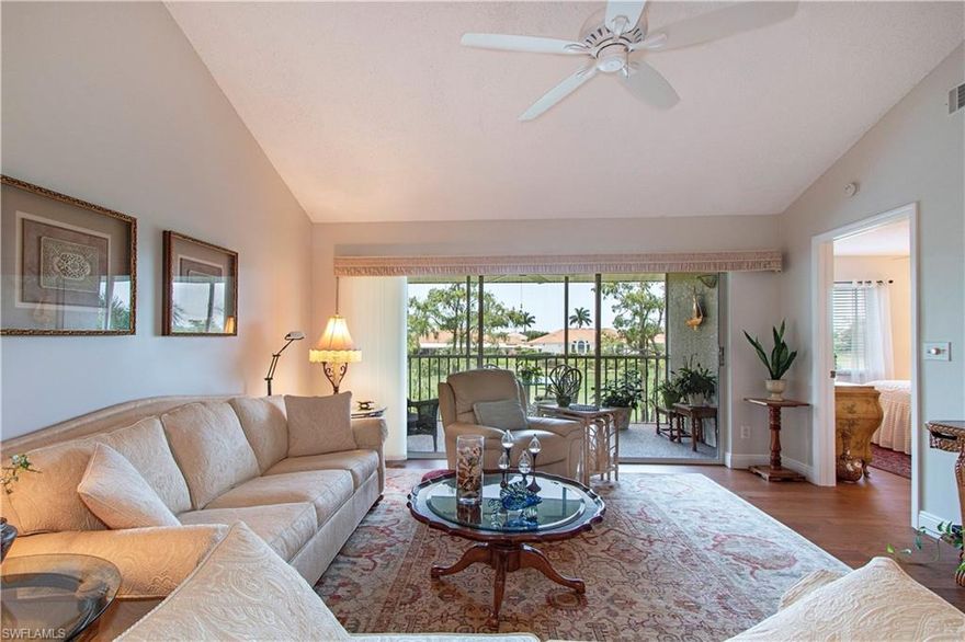 C. 17773 - Lake and golf course views.  Full Golf membership! immaculate 2+Den furnished condo is in move in condition. Seller has lovingly created this light and bright home with vaulted ceiling, brand new Hickory wood floors, freshly painted throughout (walls in latex and oil paint on trim) plus new hot water heater. Peaceful views over the 9th Fairway. Pleasant views onto a pocket park with shade trees from the kitchen window and just steps from the 1 car detached garage to the pool and tennis court. Short stroll to the Club House. Glen eagle offers an array of amenities which includes the bundled golf with this condo, tennis, a clubhouse, restaurant and lounge, card and activity rooms, pro shop, fitness center and community pools. A second restaurant called "The Divot" serves breakfast and meals, located on the golf course near the bocce courts. A peaceful retreat convenient to shopping, restaurants, Old Naples, and 10 miles of pristine Gulf beaches.